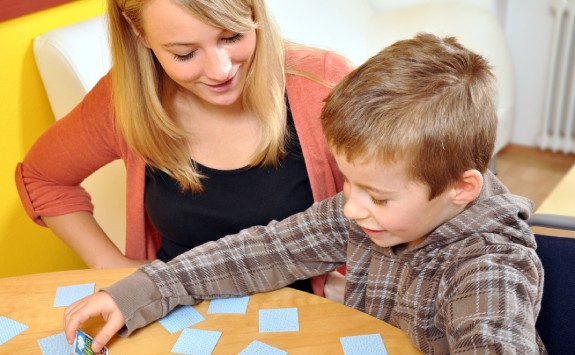A Speech and Language Sciences student teaching a child 